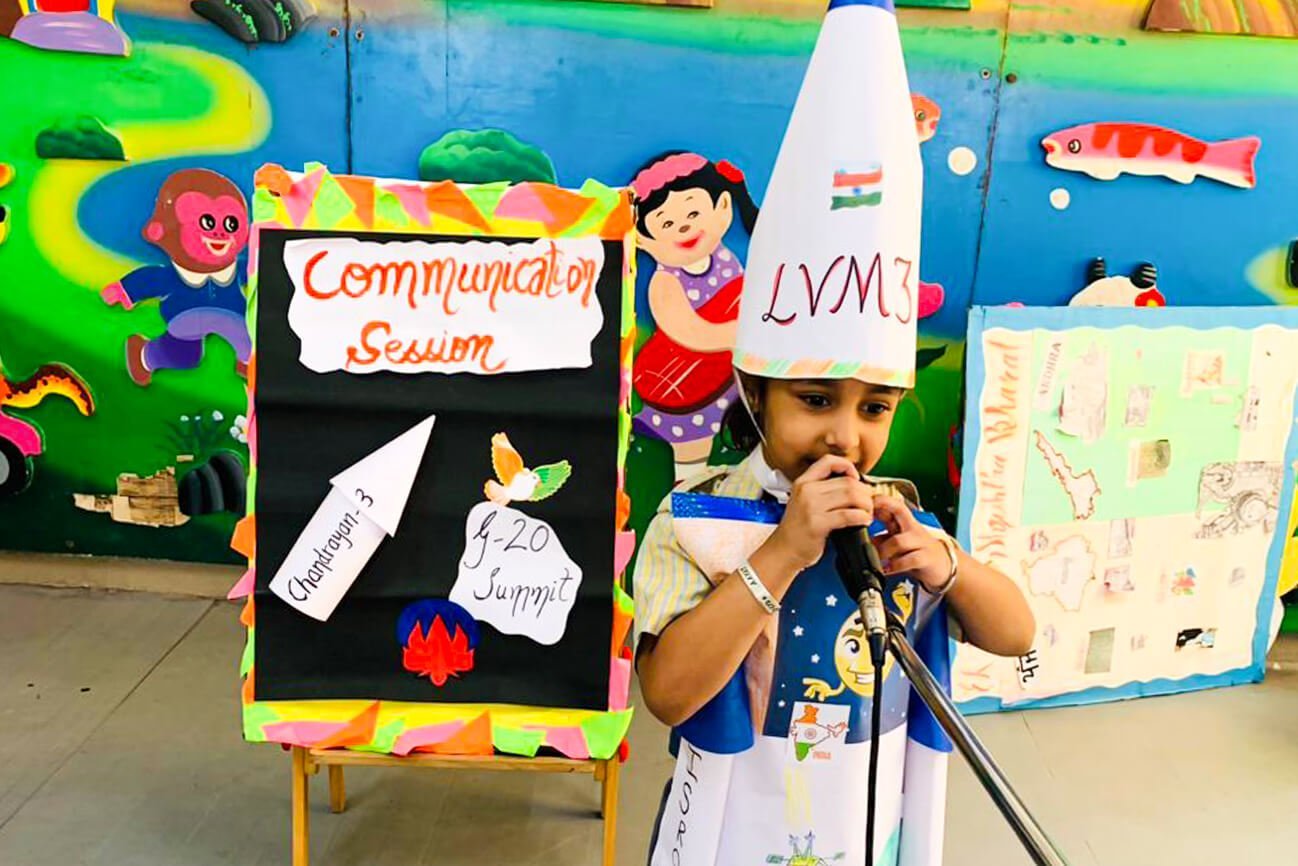 A young student speaking at a communication session