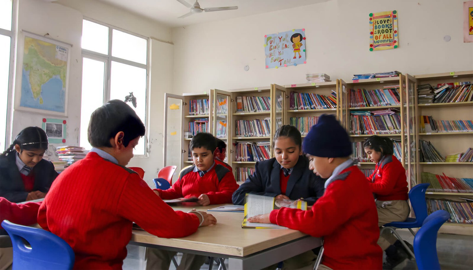 Students reading in the school library
