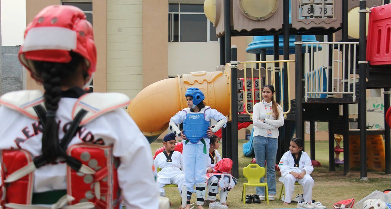 Sparring practice beside the playground
