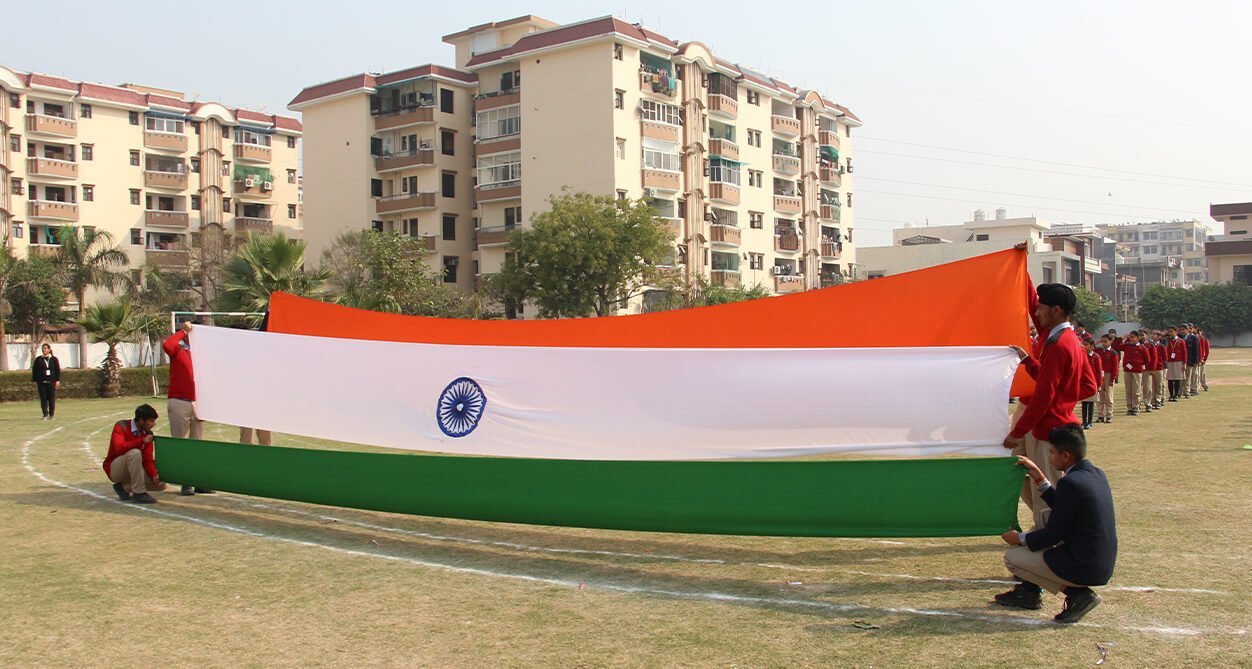 Students holding the national flag on Republic Day